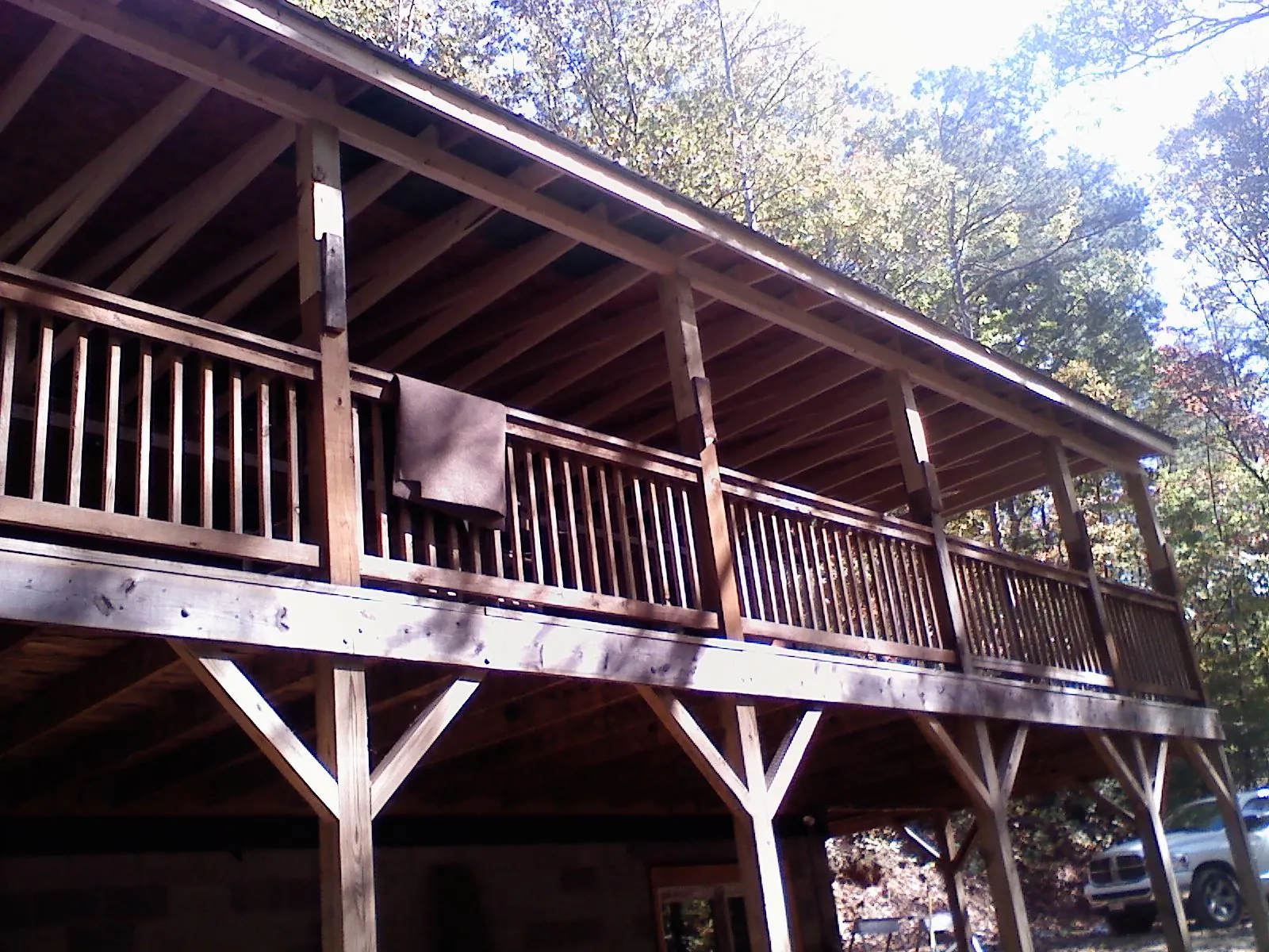 Timber framing under a new elevated porch and deck — Roof Leak Repair in Burlison by Roofing Brothers